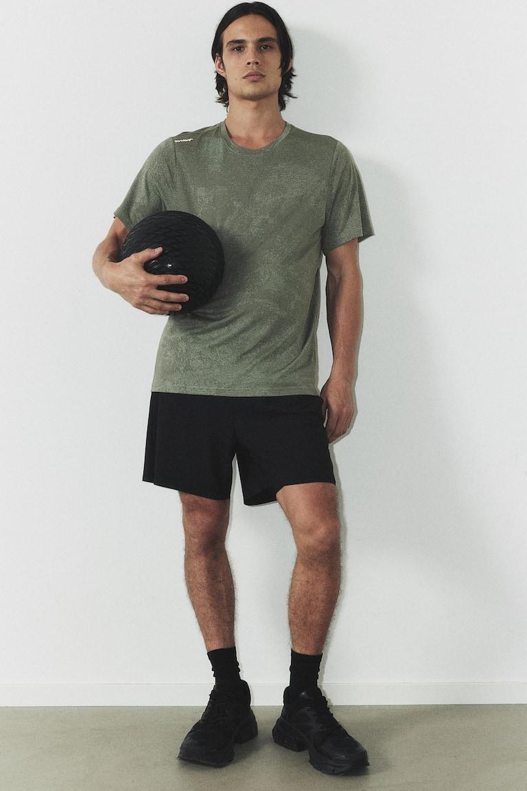 H&M Camiseta de deporte con DryMove™ Regular Fit - Verde caqui/Estampado - HOMBRE