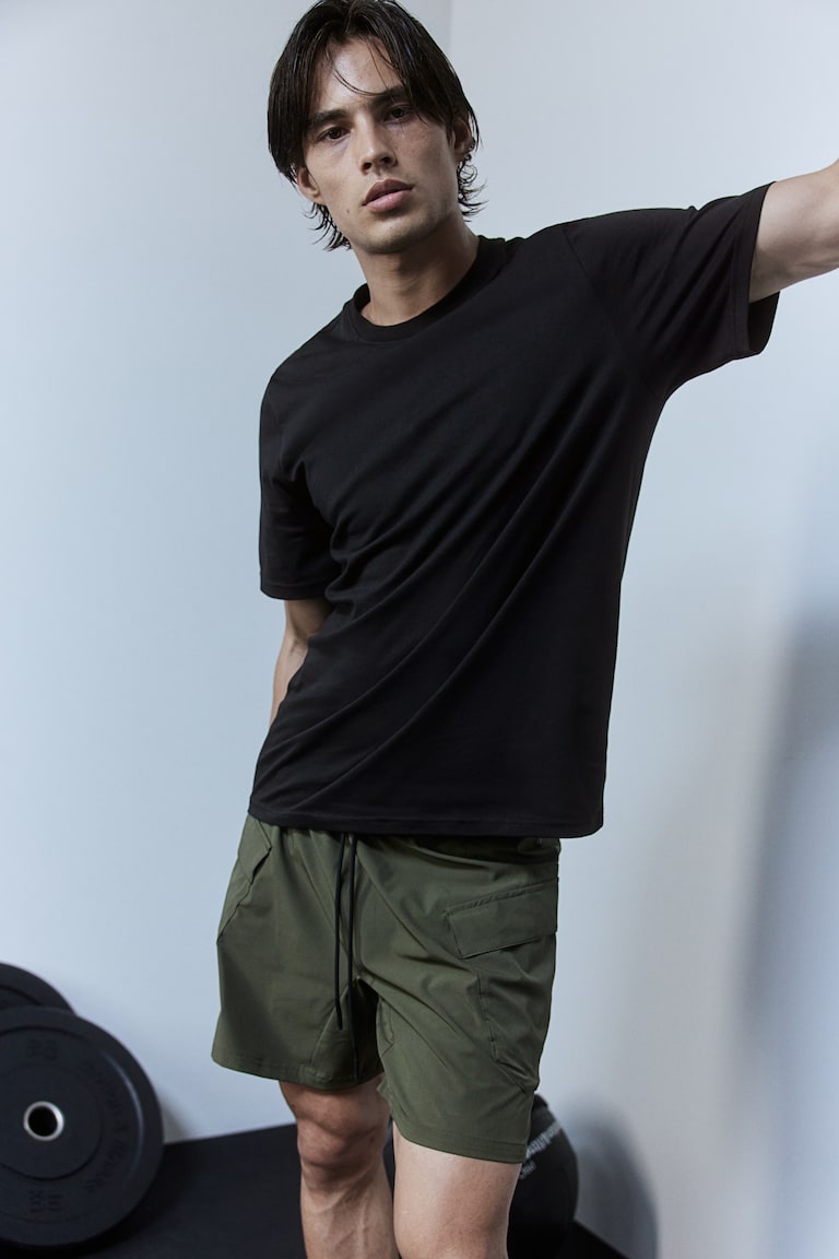 H&M Camiseta De Deporte En DryMove™ Regular Fit - Negro - HOMBRE