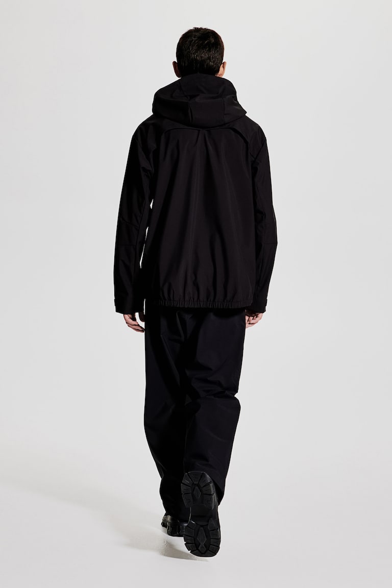 H&M Chaqueta Softshell Repelente Al Agua Regular Fit - Negro - HOMBRE