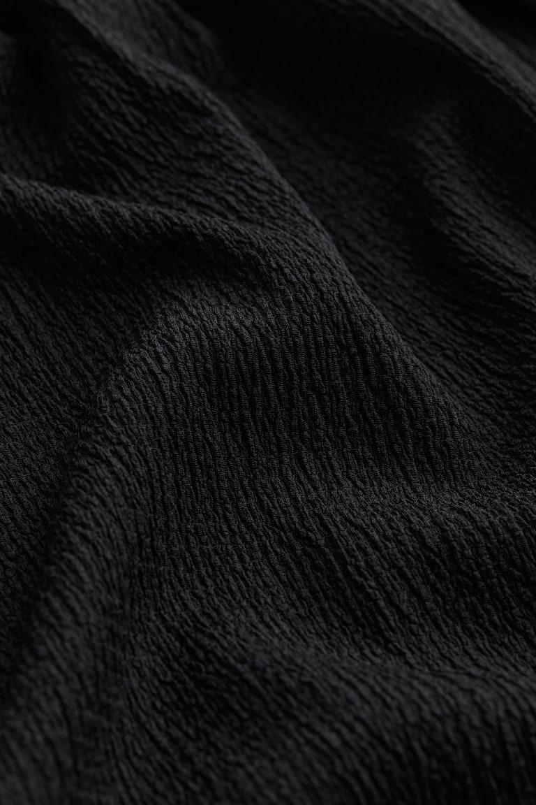 H&M Vestido Con Cuerpo Nido De Abeja - Negro - MUJER