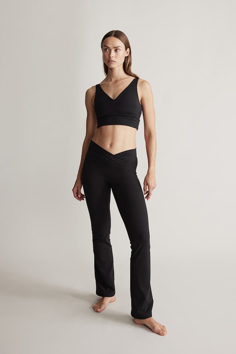 H&M Leggings de deporte acampanados con SoftMove™ - Negro - MUJER