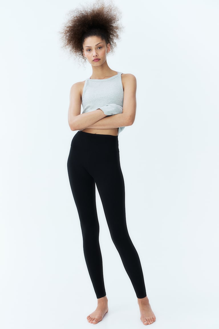 H&M Leggings de yoga con SoftMove™ Lycra® - Blanco - MUJER