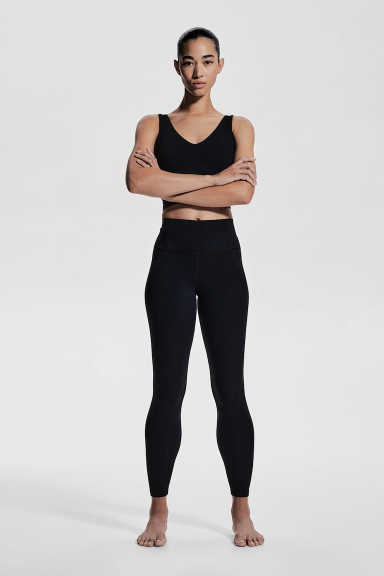 H&M Leggings de yoga tobilleros con SoftMove™ Lycra® - Beige claro - MUJER