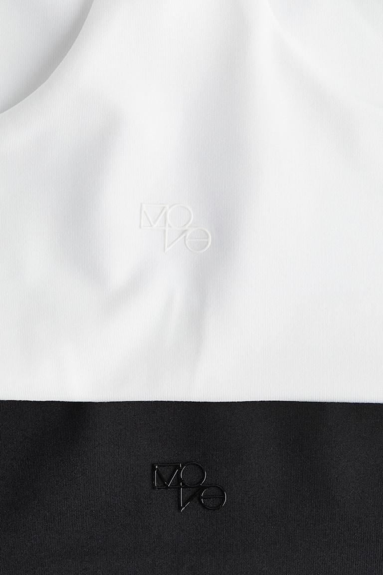 H&M Pack De 2 Sujetadores De Deporte Medium Support - Turquesa Claro/Blanco - MUJER