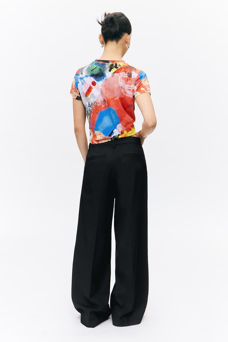 H&M Pantalón Plisado De Tiro Alto Y Pernera Ancha - Negro - MUJER