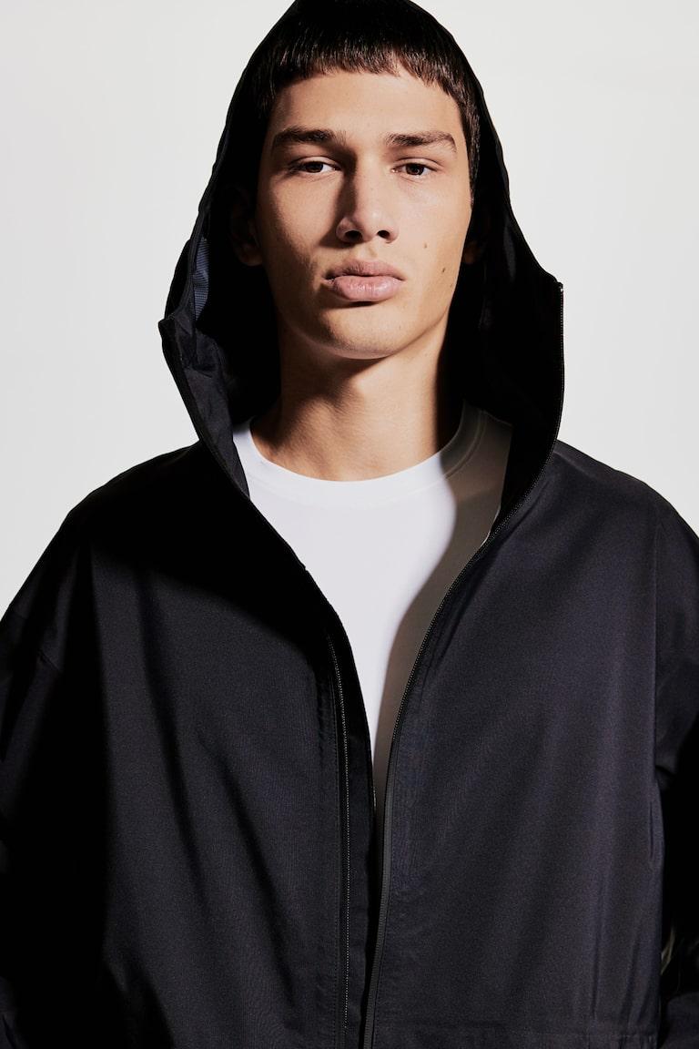H&M Parka Chubasquero Con StormMove™ Loose Fit - Negro - MUJER