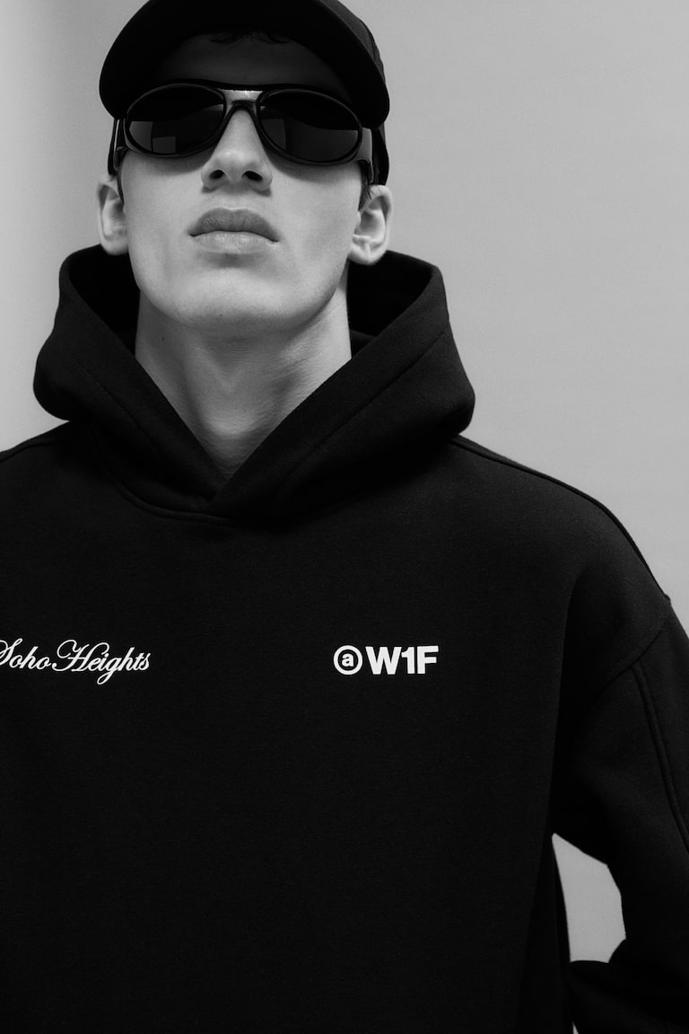 H&M Sudadera con capucha y estampado Loose Fit - Negro - HOMBRE