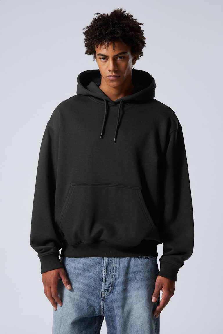 H&M Sudadera gruesa con capucha de corte holgado - Negro - HOMBRE