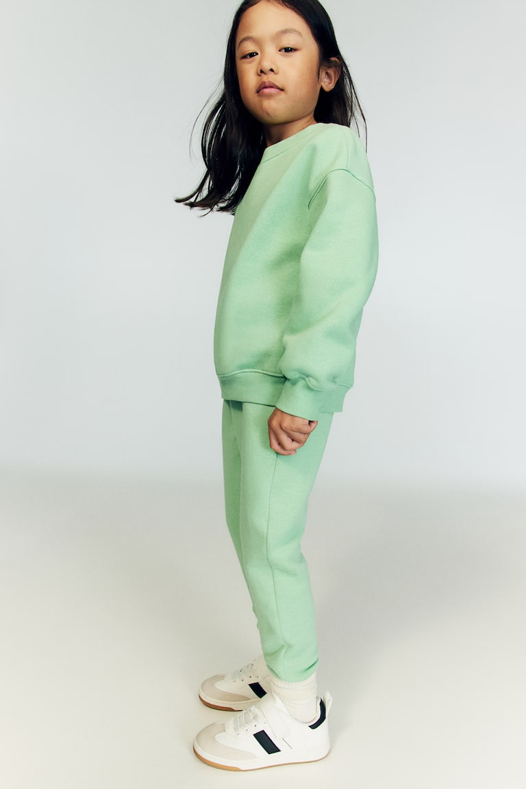 H&M Sudadera oversize con cuello redondo - Turquesa/Rayas - NIÑOS