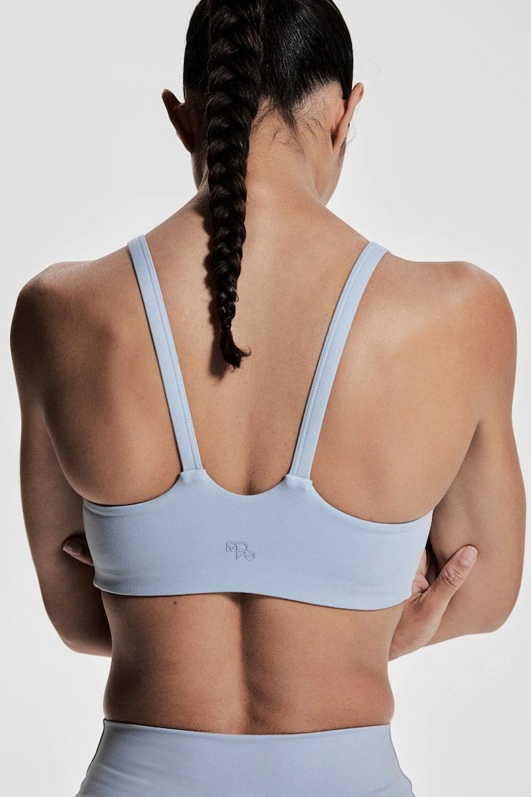 H&M Sujetador De Deporte Con SoftMove™ Medium Support - Blanco - MUJER