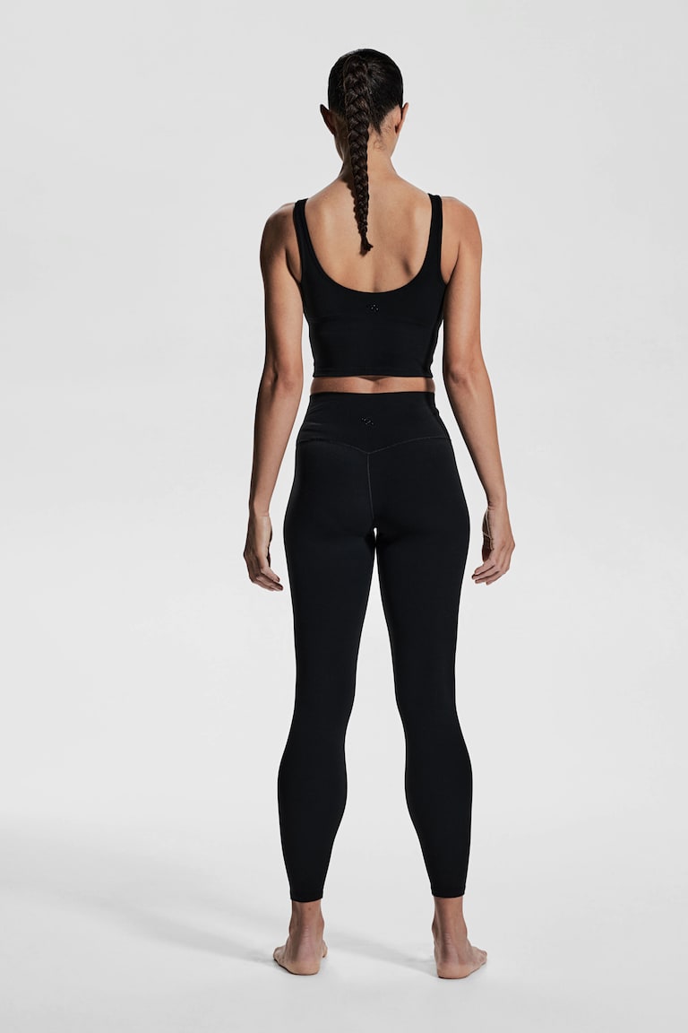 H&M Sujetador De Yoga SoftMove™ Lycra® Light Support - Marrón Oscuro - MUJER
